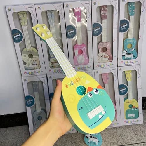 Guitarra De Juguete Diseño Dinosaurio Infantil 36 X 12 Cm — imagen 3 de 5