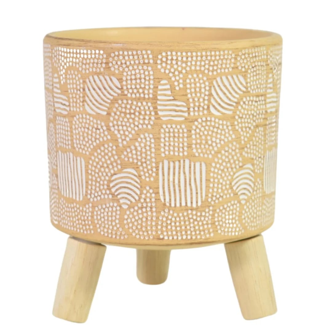 Maceta de cerámica con patas de madera beige
