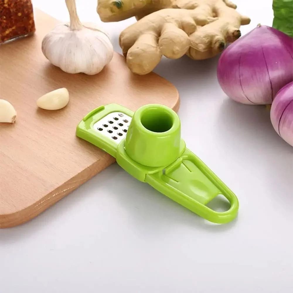 Rallador De Ajo Plastico Ojas De Acero Inox 14 Cm Grupo Dos — miniatura 2