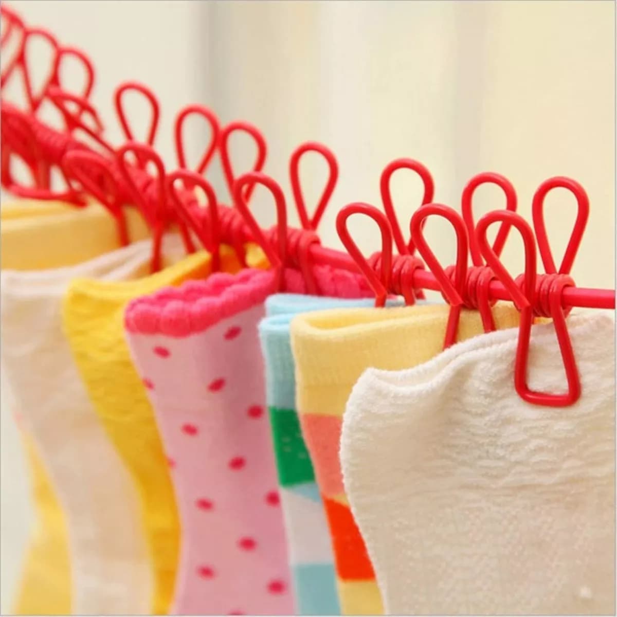 Tendedero Para Ropa Cuerda Elástico Con 12 Palillos 180 Cm — imagen 3 de 5